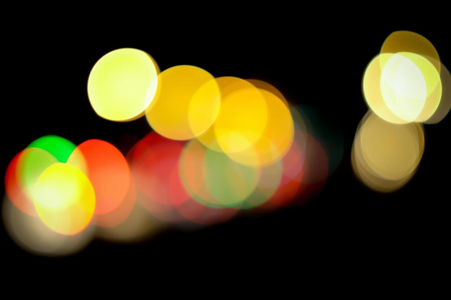 Abstract blurry lights in the dark photo