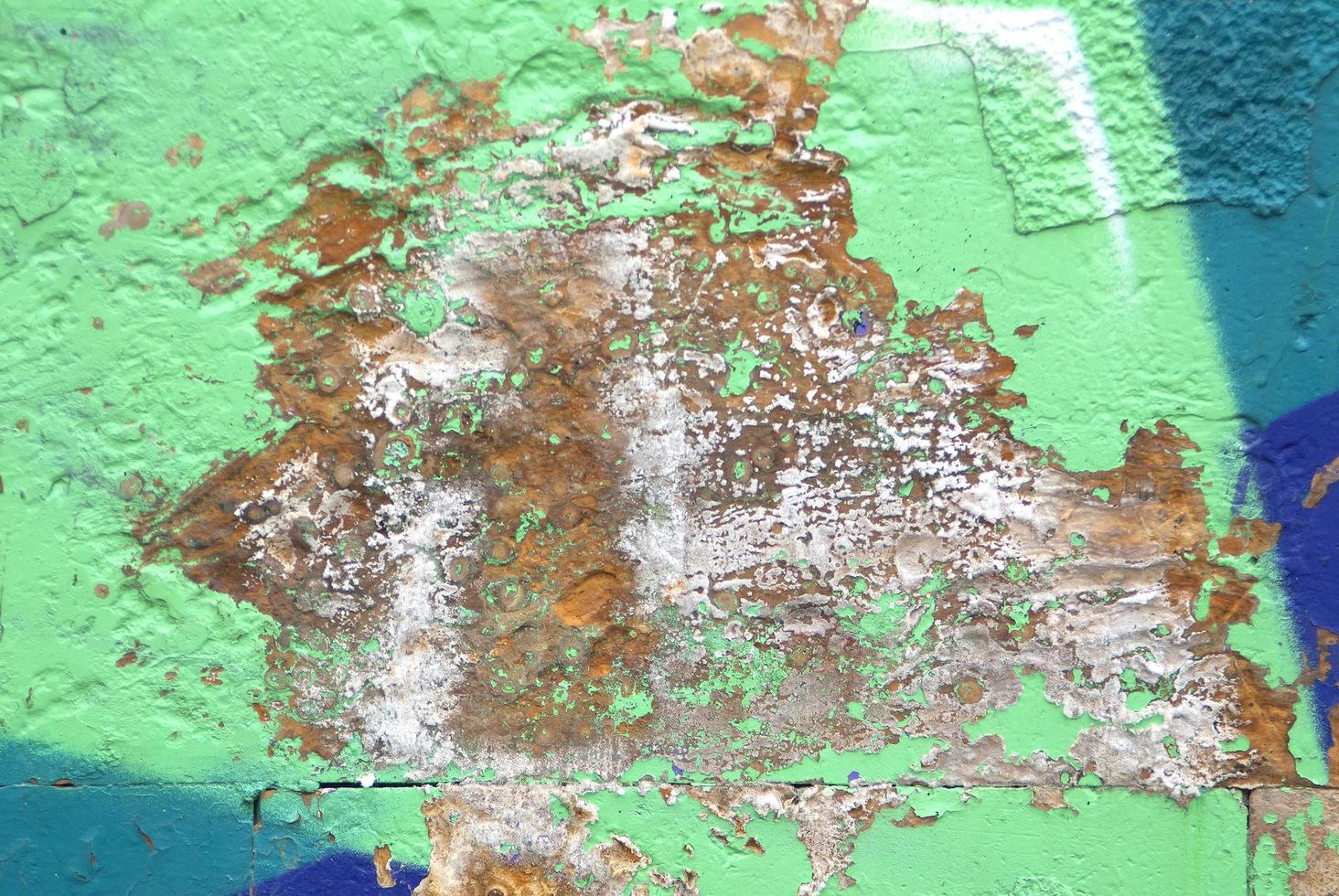 Graffiti with peeling paint photo