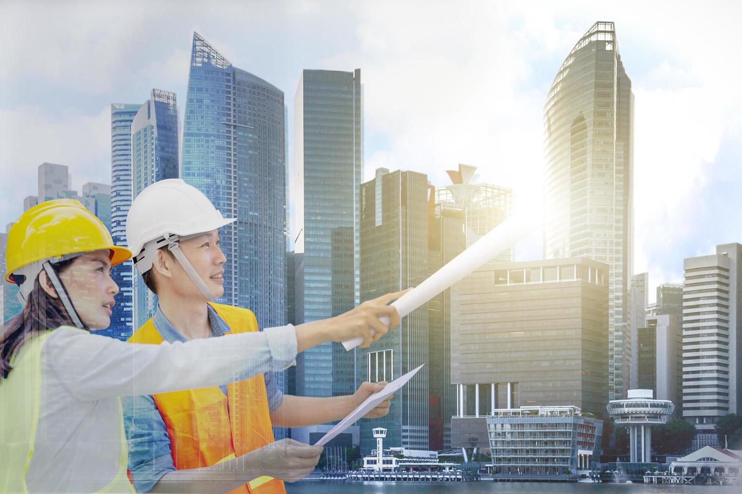 The double exposure image of the Engineer manager with cityscape view  construction city life and future plan concept photo