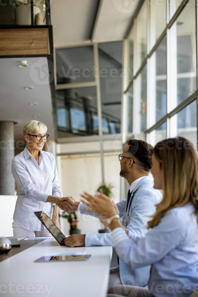 Vertical view of a group of business people photo