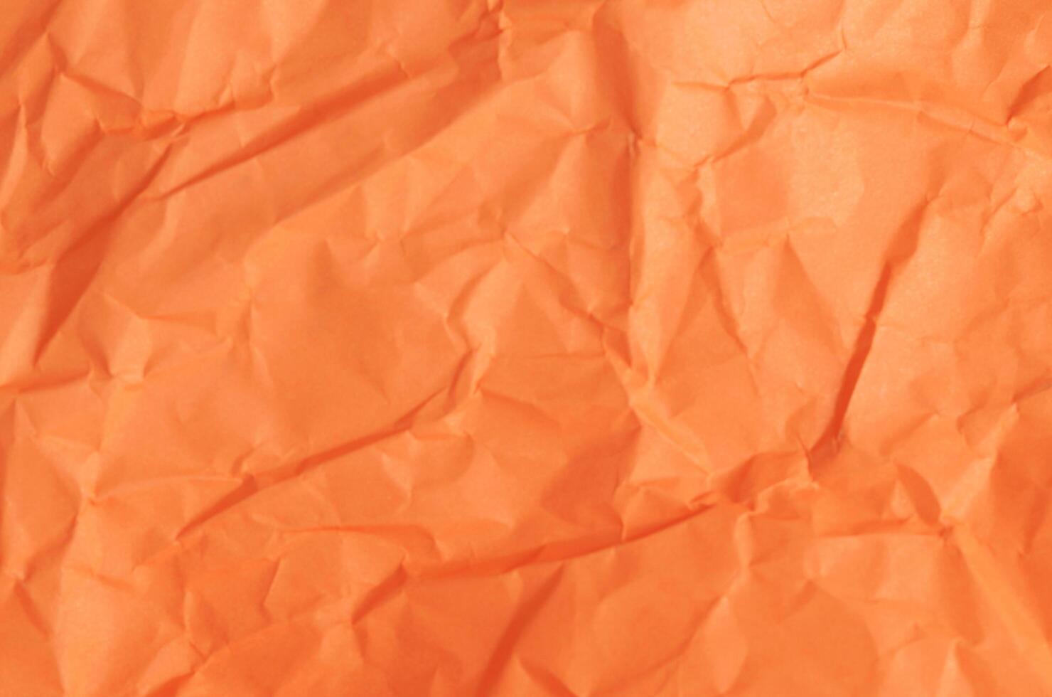 Textura de fondo abstracto con hoja de papel de color naranja foto