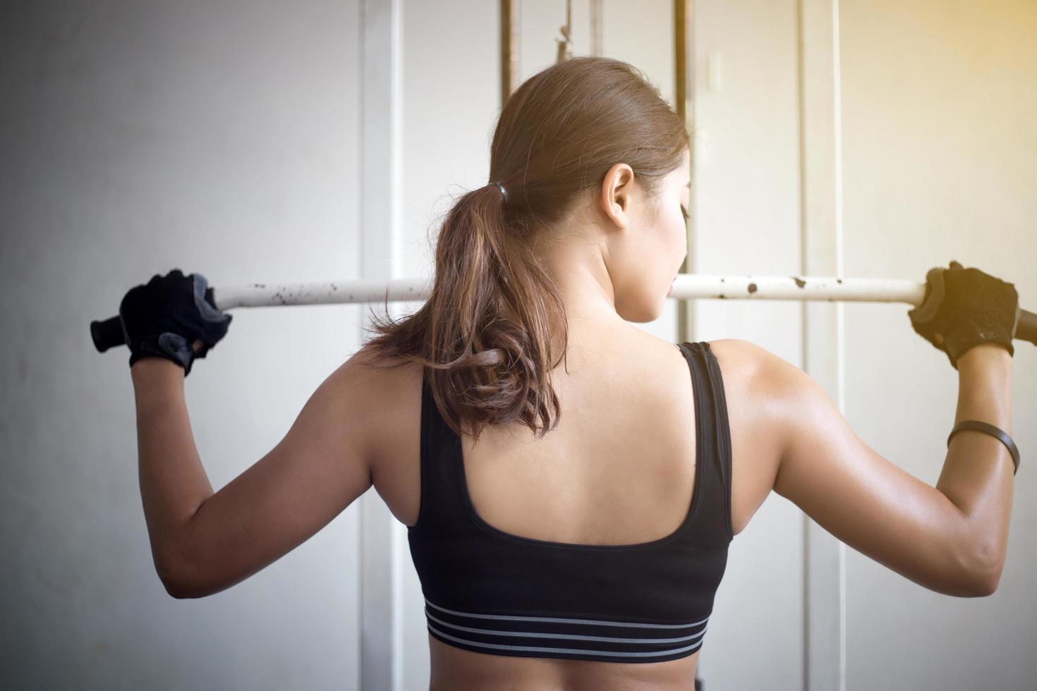 Woman working out in the gym photo