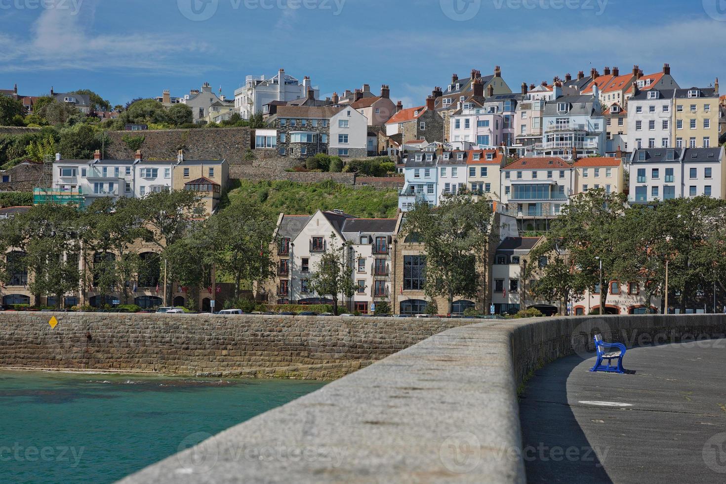 Scenic view of a bay in Saint Peter Port in Guernsey Channel Islands UK photo