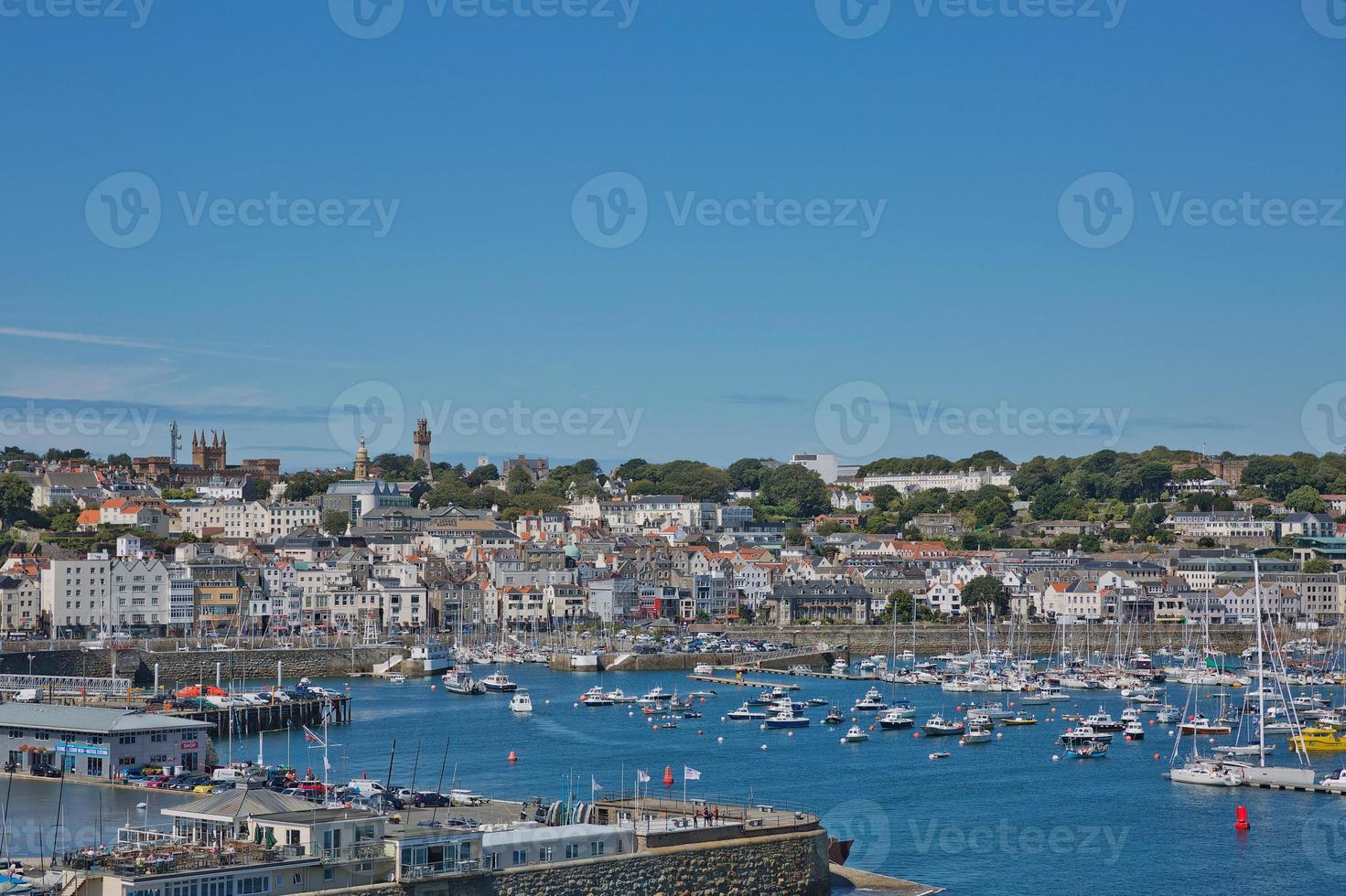 Scenic view of a bay in Saint Peter Port in Guernsey Channel Islands UK photo