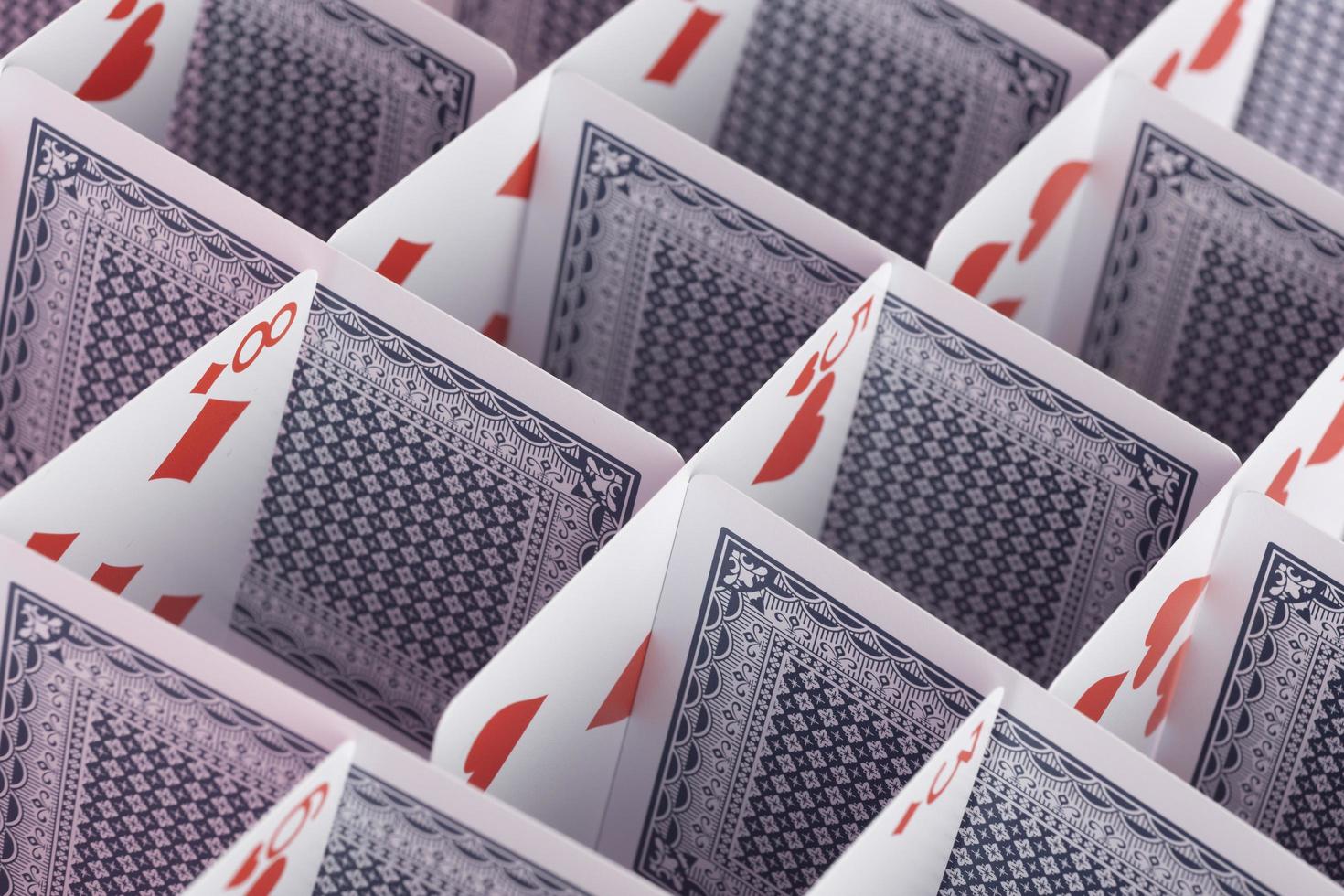 Structure made of cards background photo