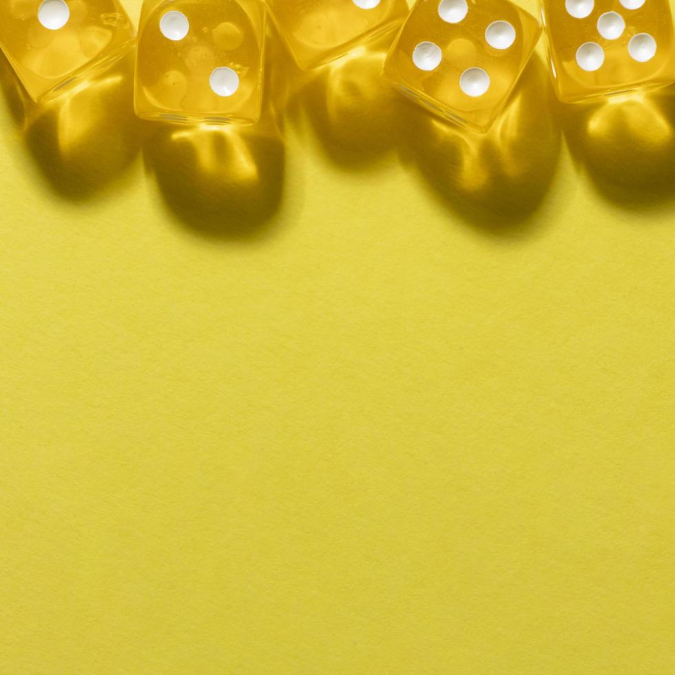 Yellow background with border of yellow dices photo