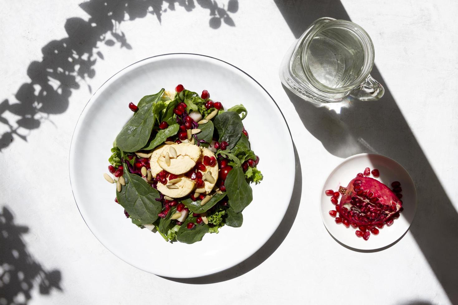 Spinach salad with water photo