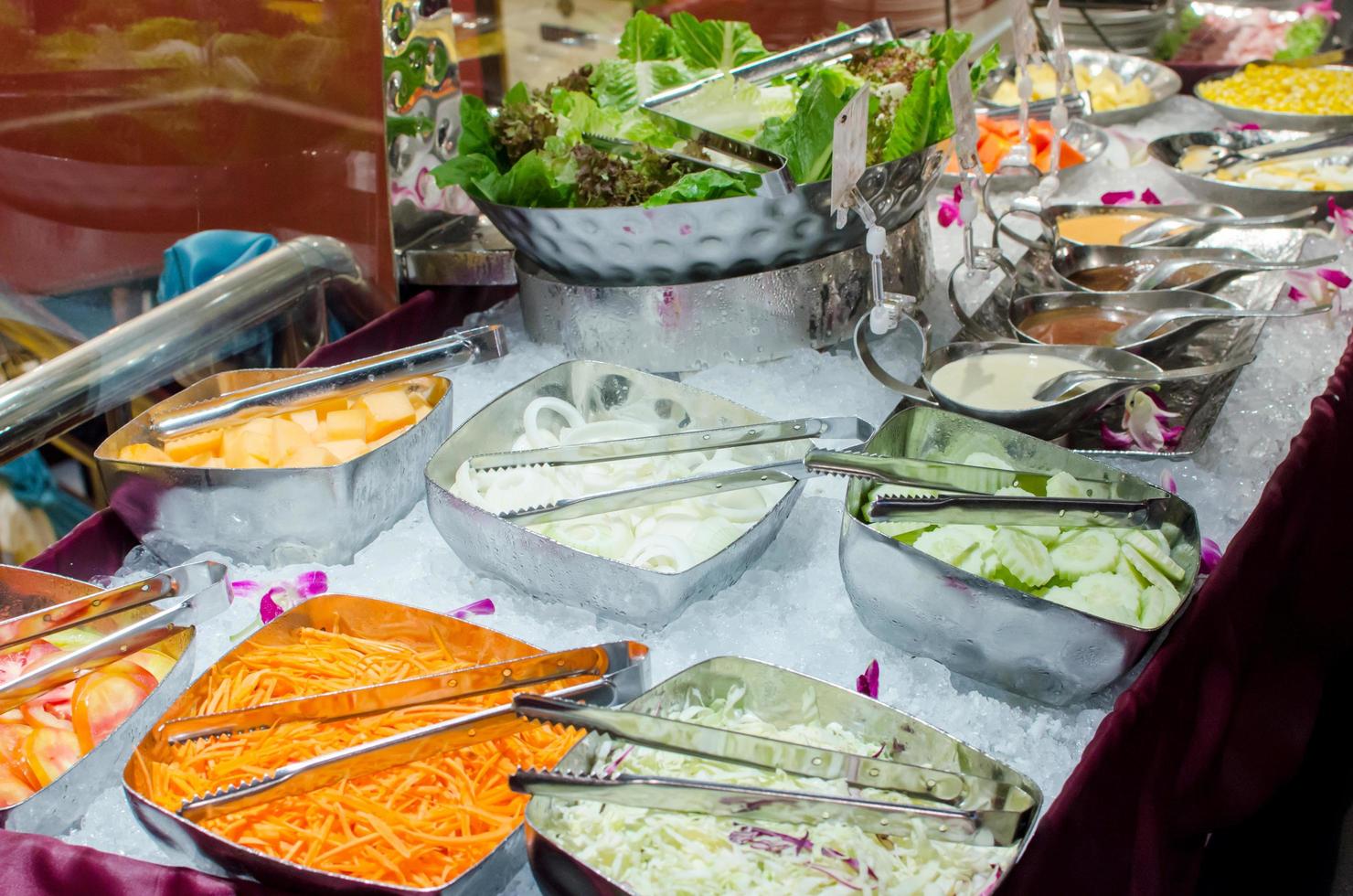 Salad bar with vegetables in the restaurant photo