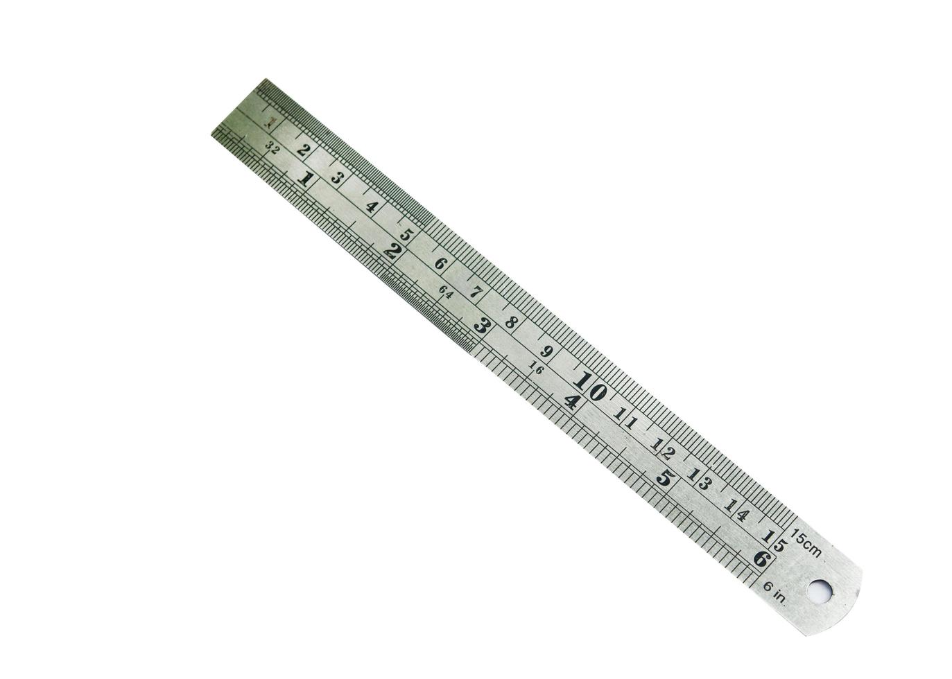 Steel ruler on the white background. photo