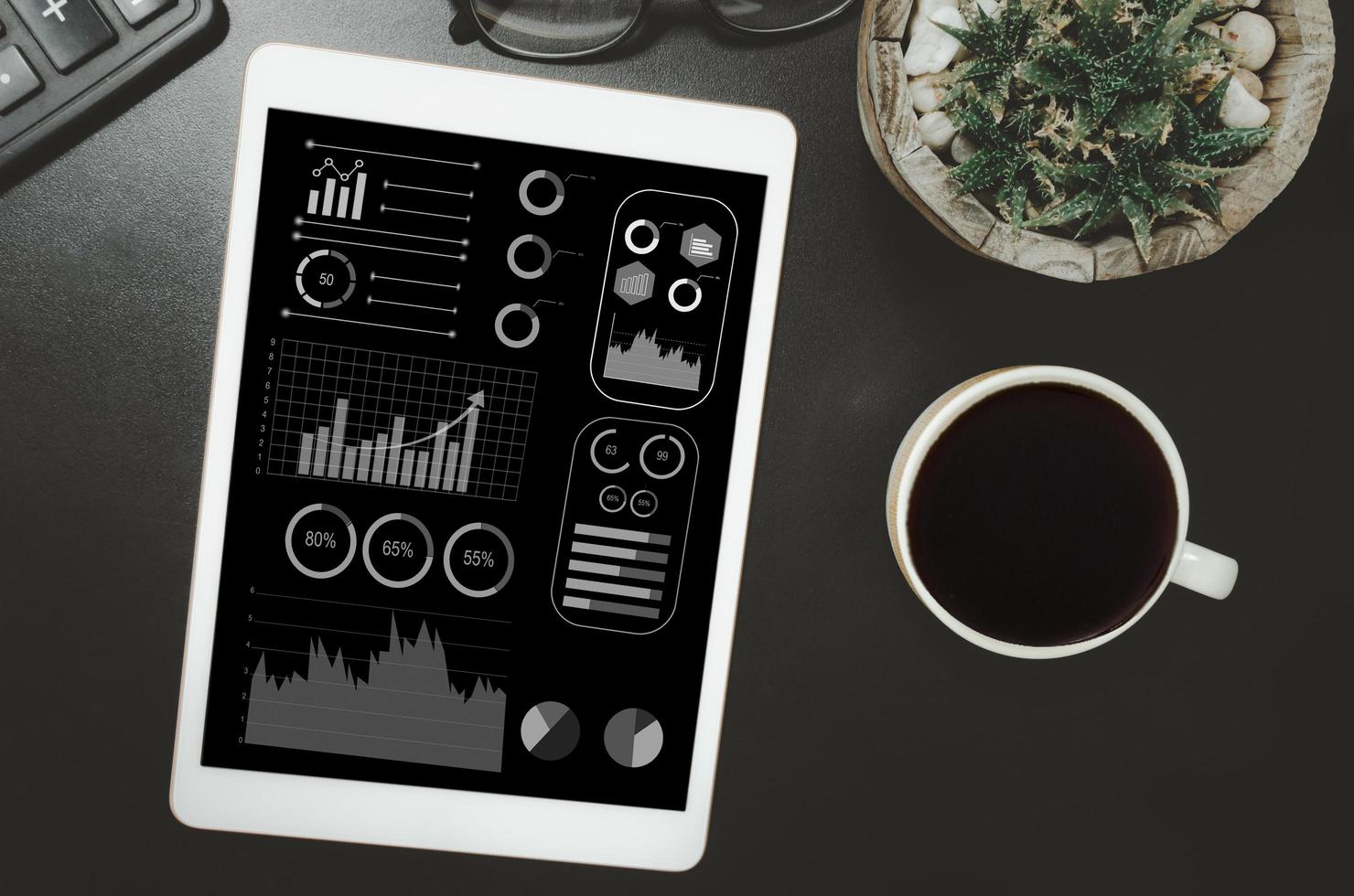 Business graphs and tablet charts, analyze financial statements. Marketing and profit and loss in business plan. Top view photo