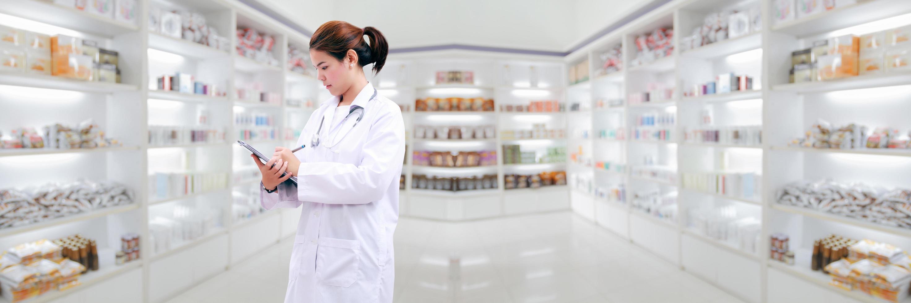 Pharmacist with pharmacy background photo