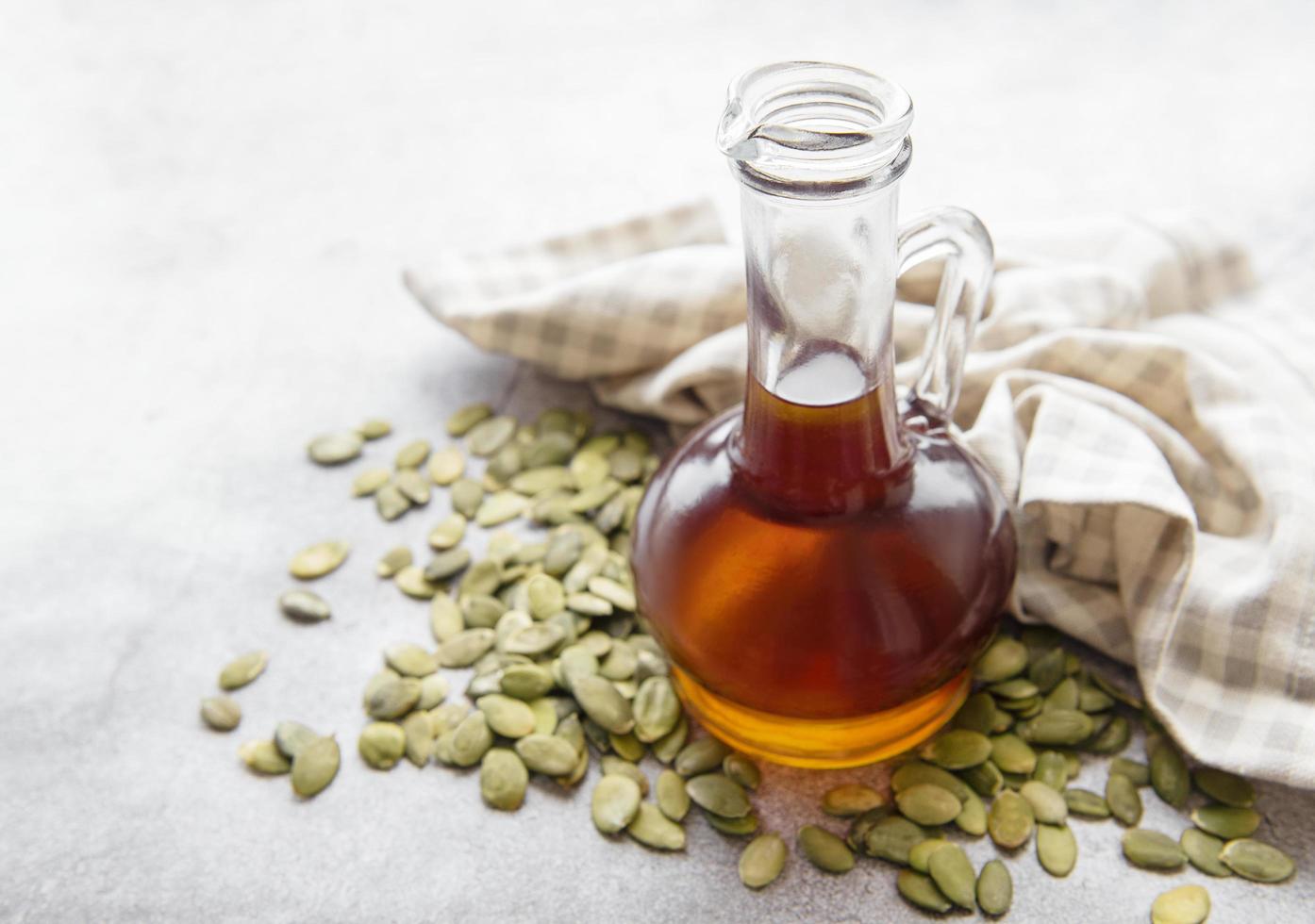 Bottle with pumpkin seed oil photo