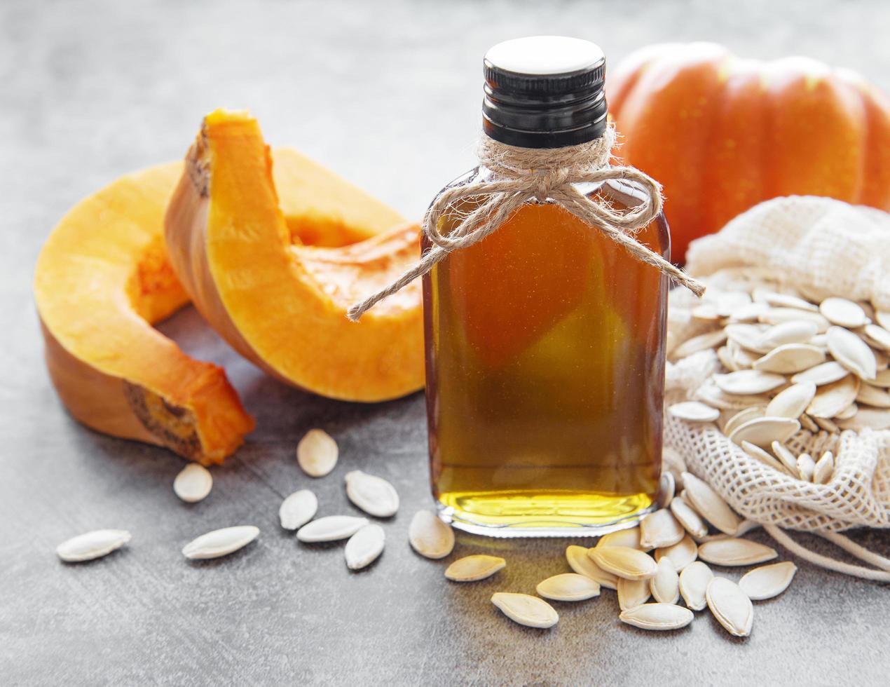 Bottle with pumpkin seed oil photo