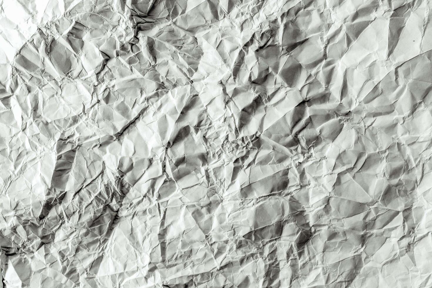 Crumpled paper background texture photo