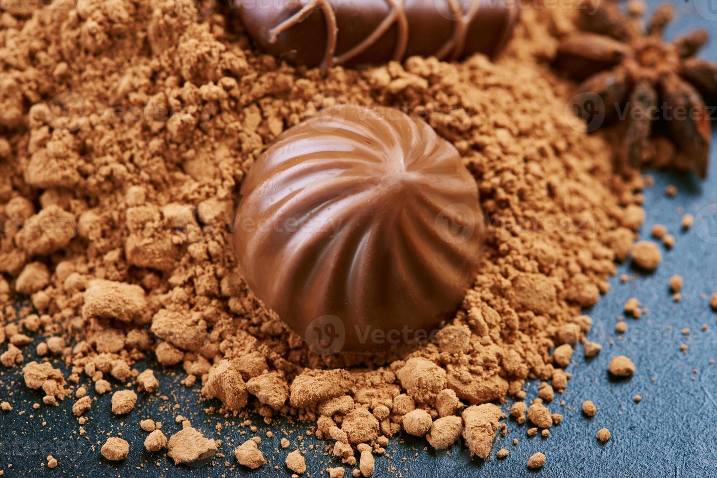 Chocolate candies on a dark background photo