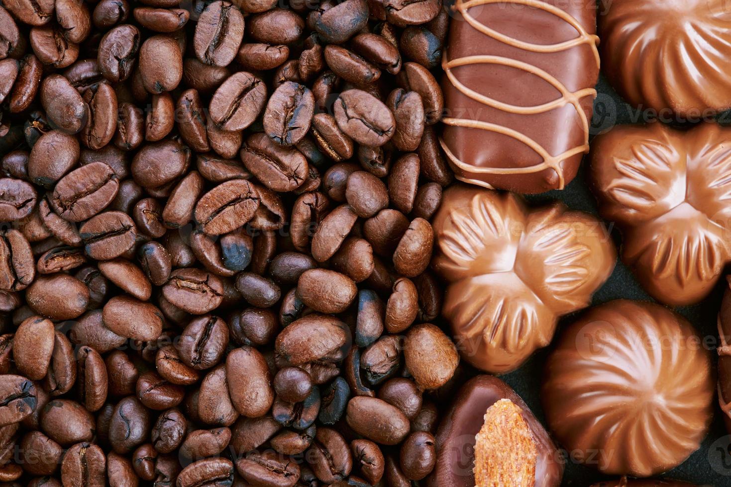 Chocolate candies and coffee beans photo