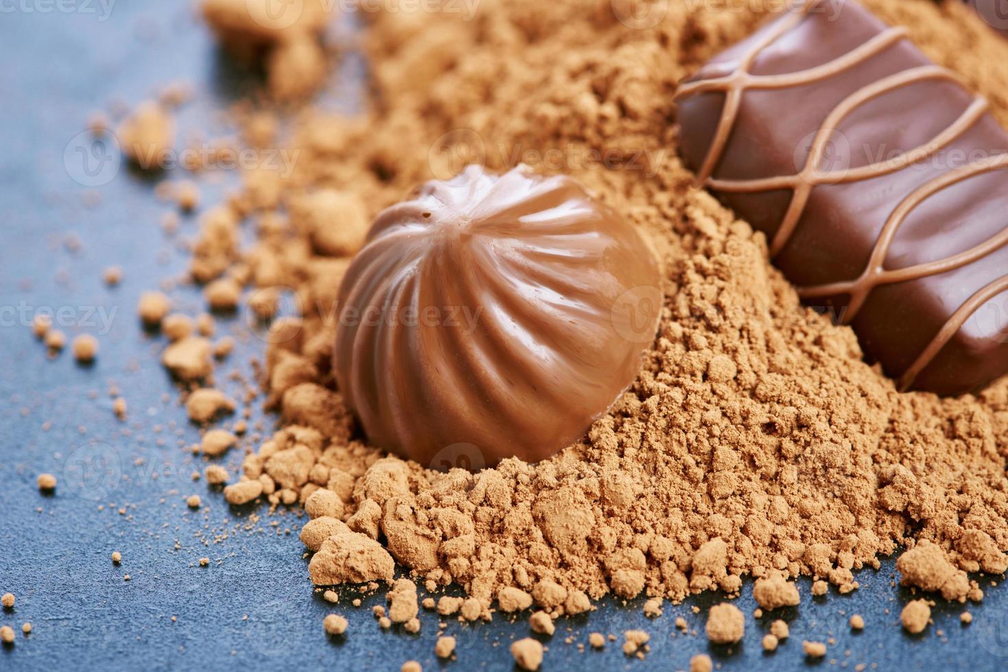 Chocolate candies on a dark background photo