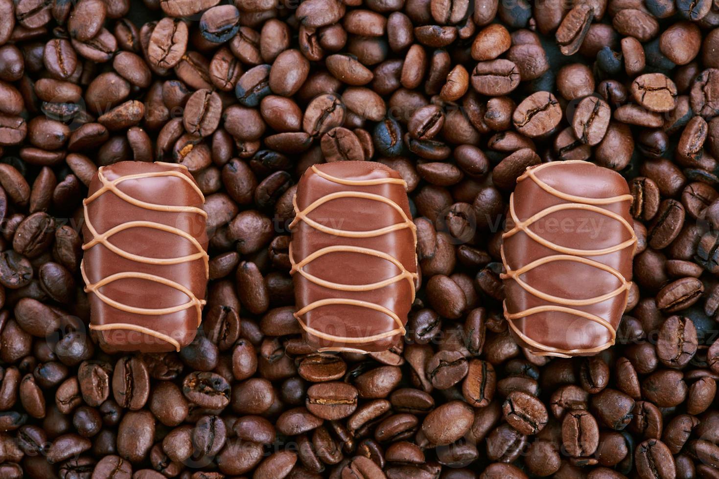 Chocolate candies and coffee photo