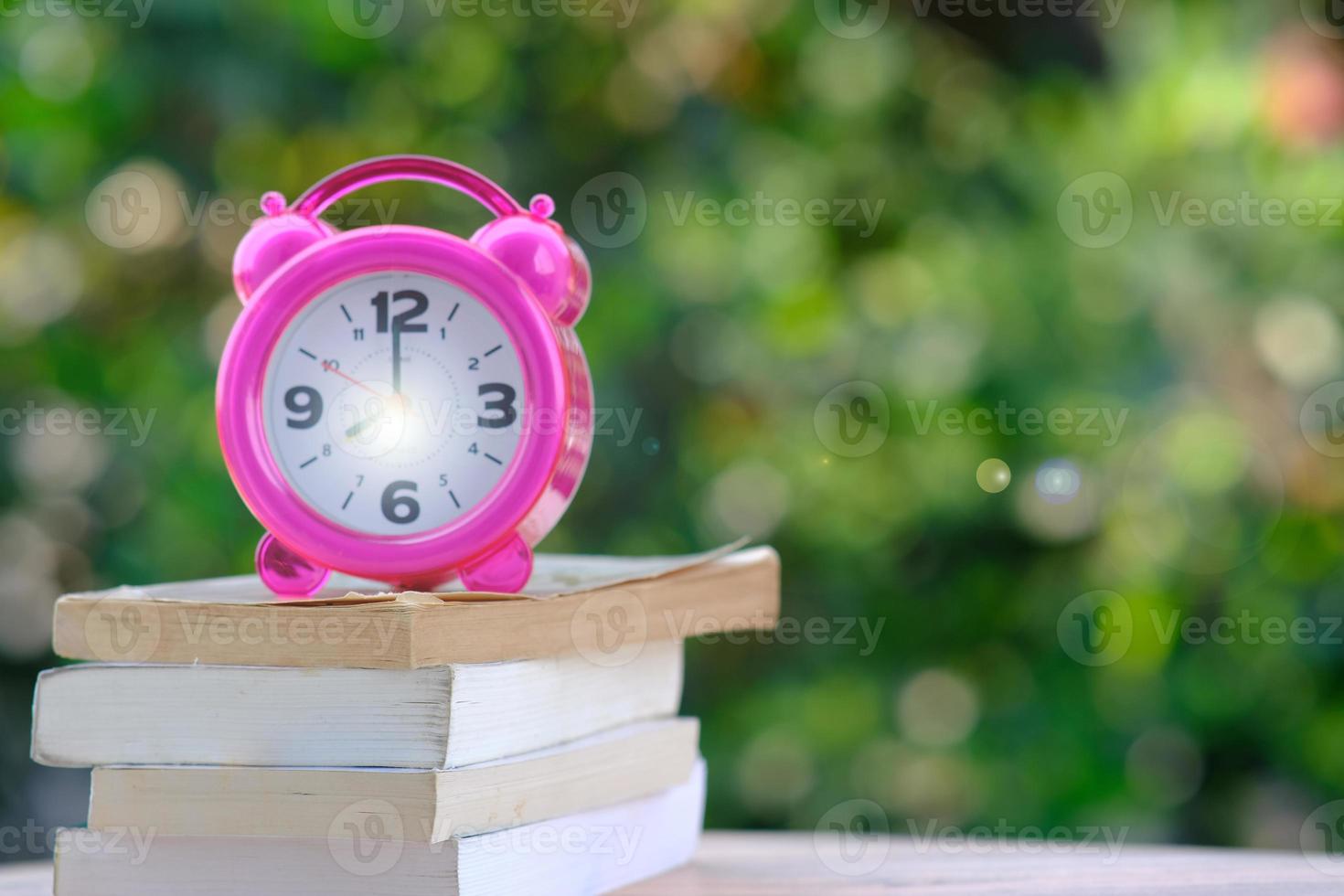 Book on wood table and education learning concept photo