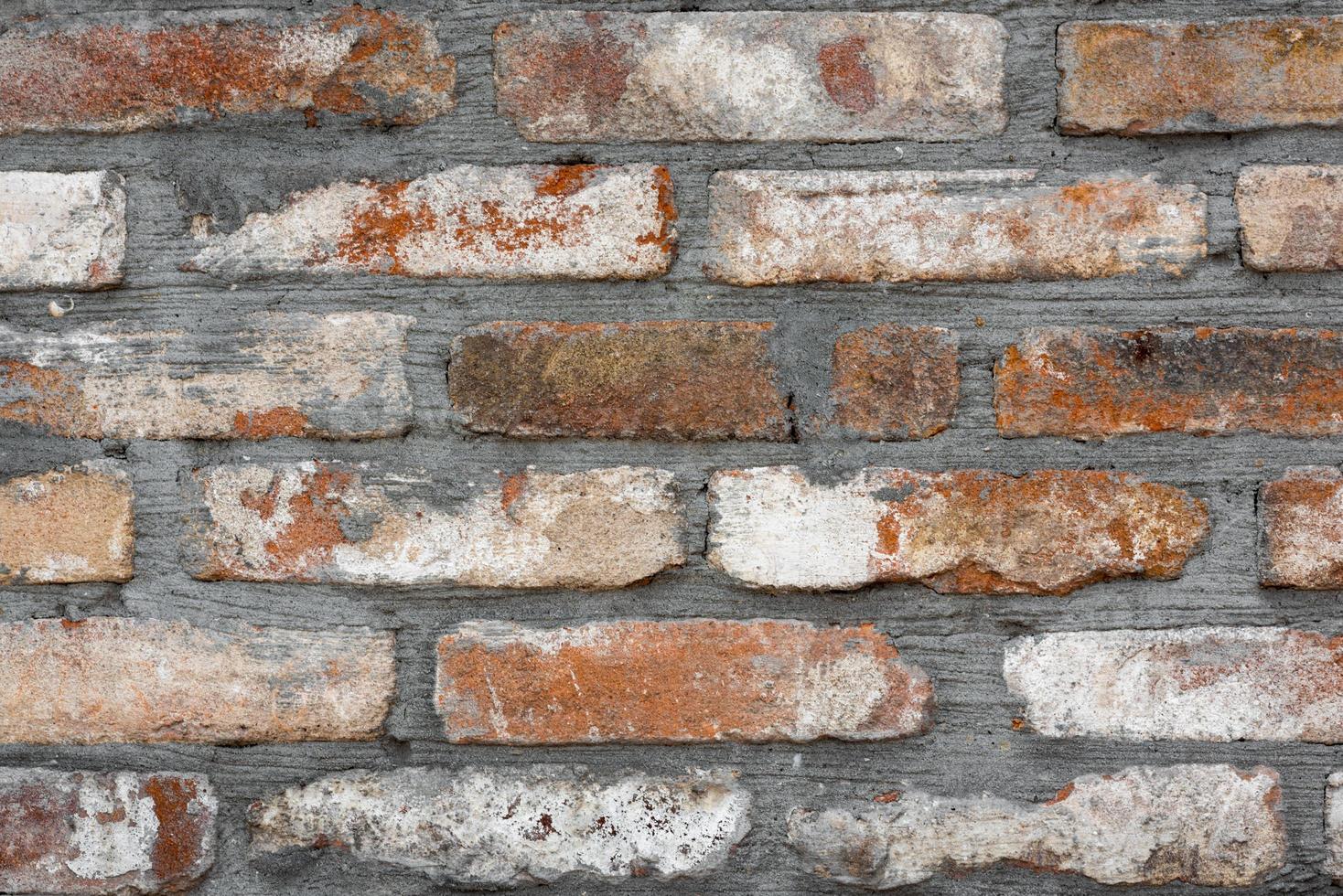 pared de ladrillo antiguo de cerca foto