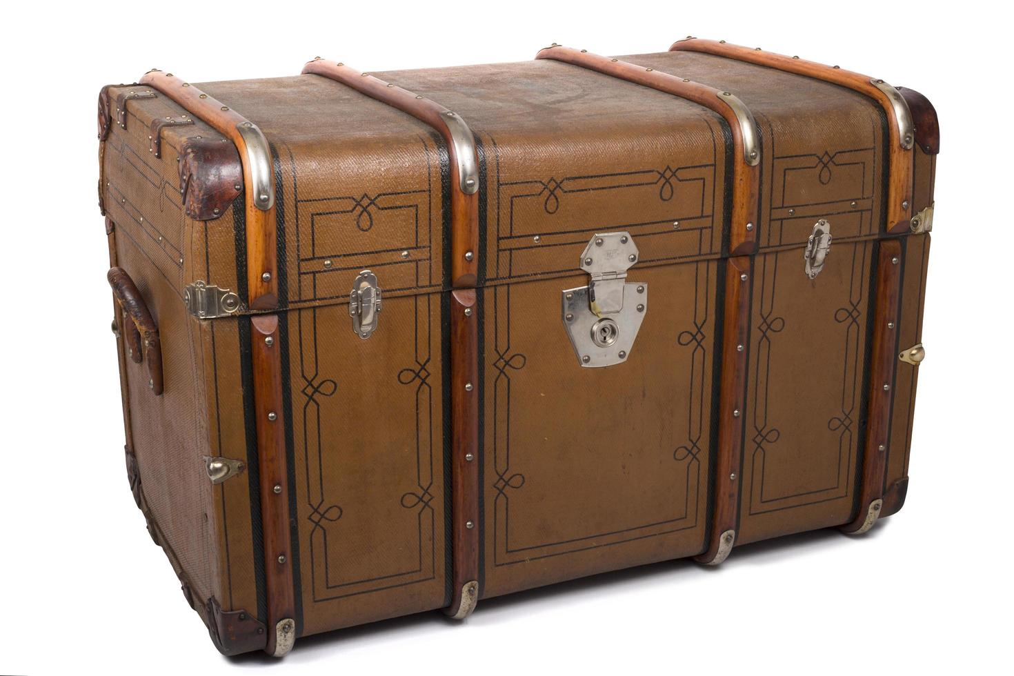 Antique Tin Travel Trunk Steamer Chest closed isolated on white background photo