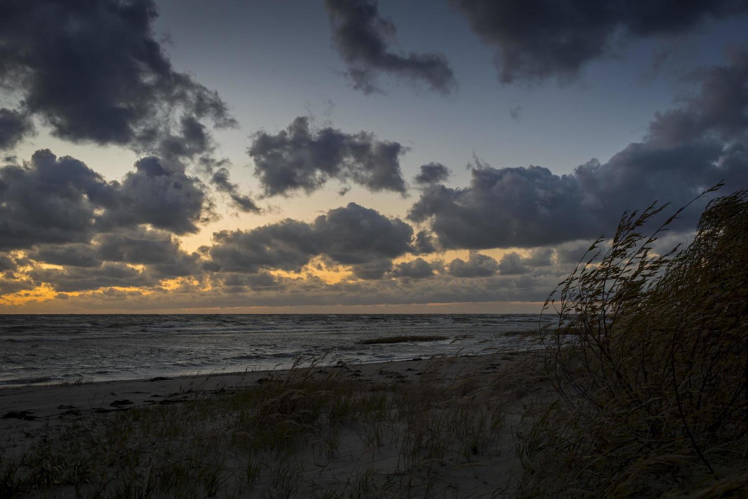 Storm clouds storm passing over the sea photo