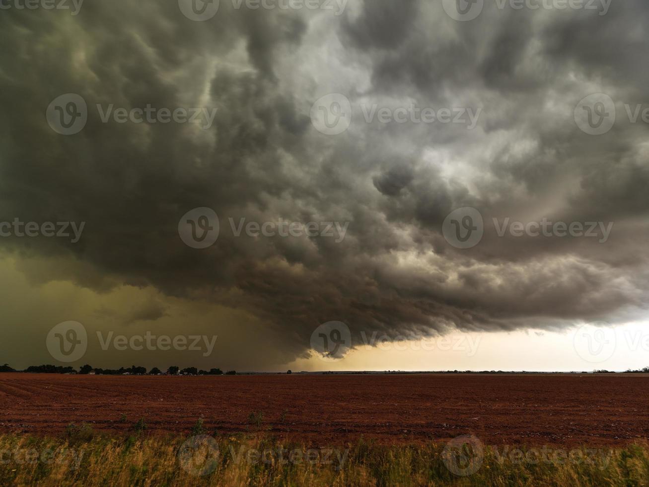 Rear flank downdraft of a thunderstorm passing over fields in Texas