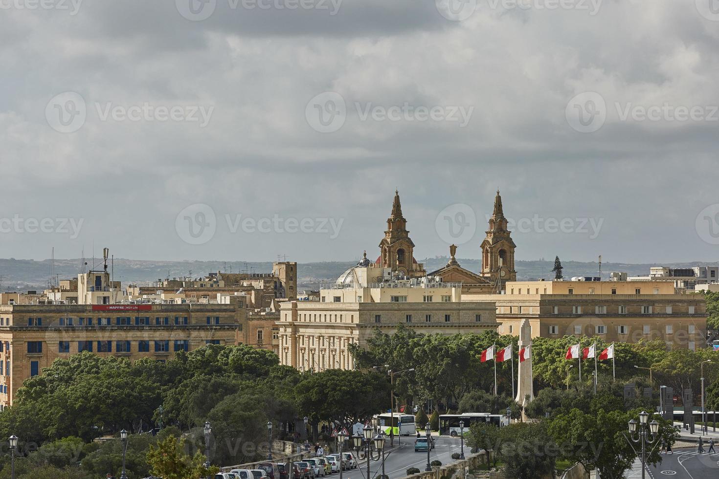 Traffic through downtown area of Valletta in Malta photo