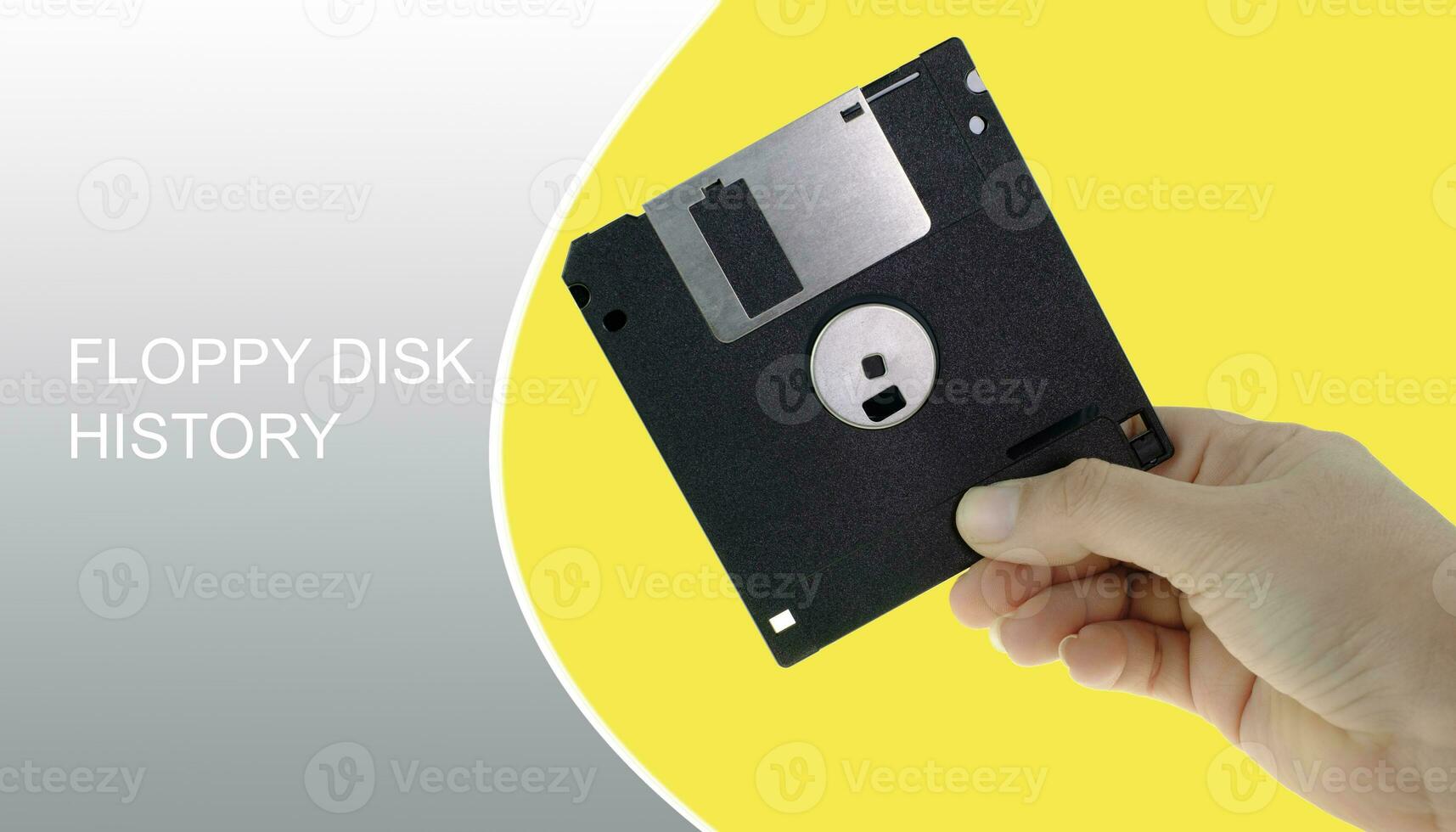 Floppy disk in a human hand photo