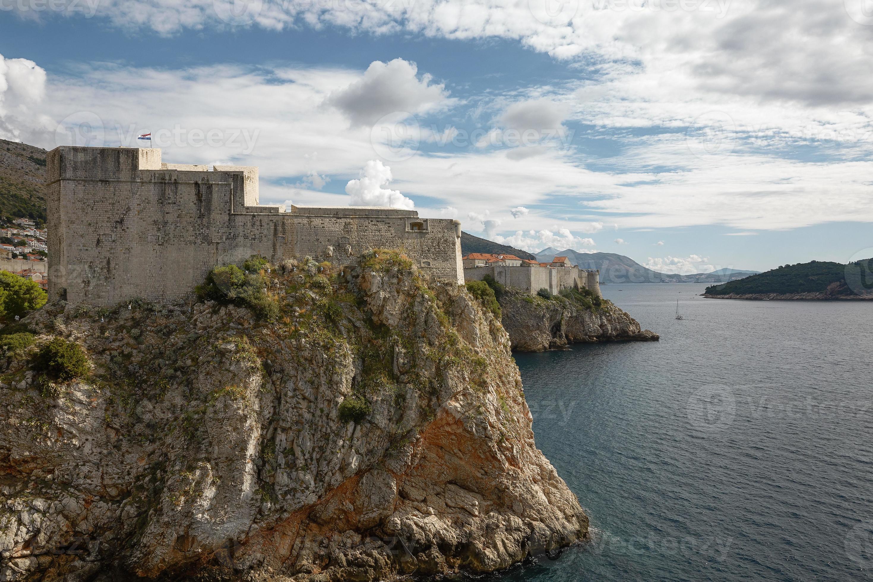 Ancient fortress on the cliff edge of Dubrovnik Croatia protects the por photo