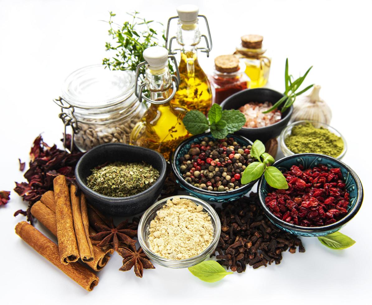 Various spices isolated on white background top view photo