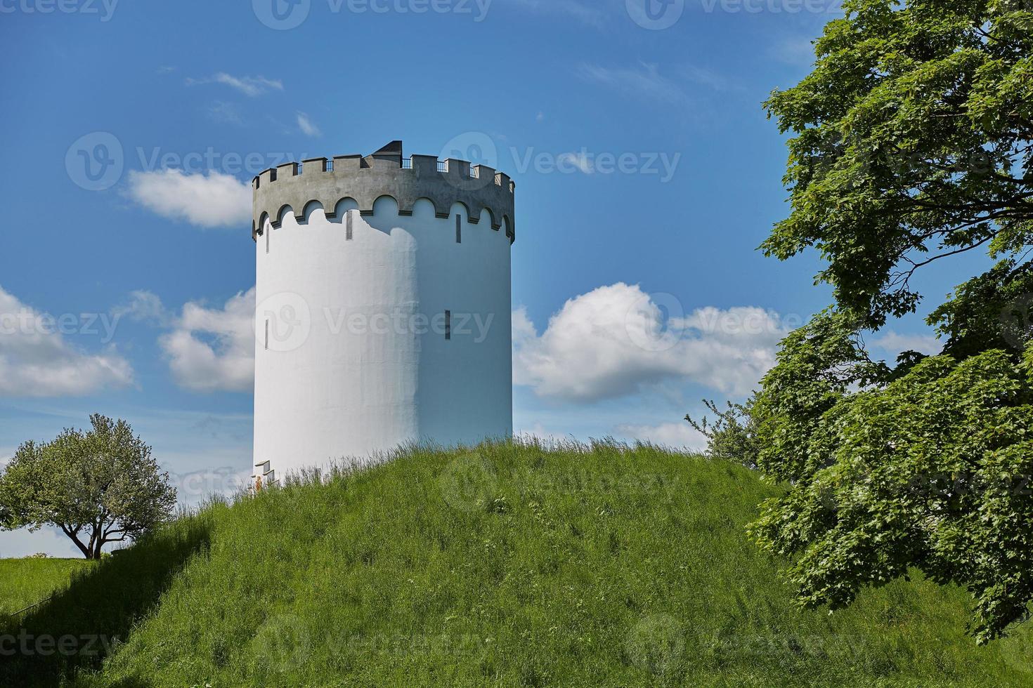 Old white water tower on rampart in city Fredericia Denmark photo