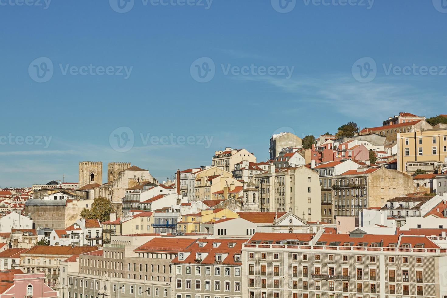 View of traditional architecture and houses on Sao Jorge hill in Lisbon Portugal photo