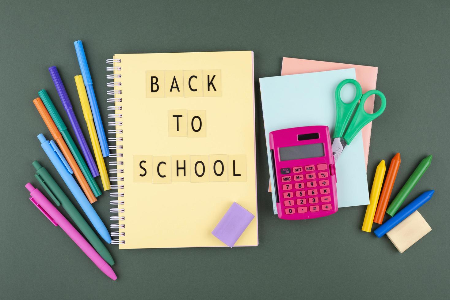 Back to school background with school supplies background photo