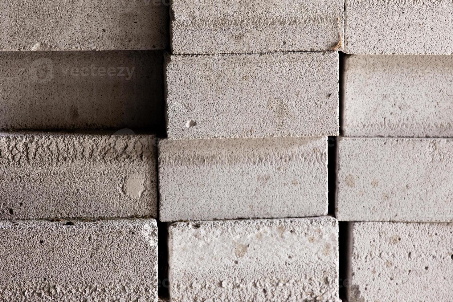 Background from white brick building or construction material photo