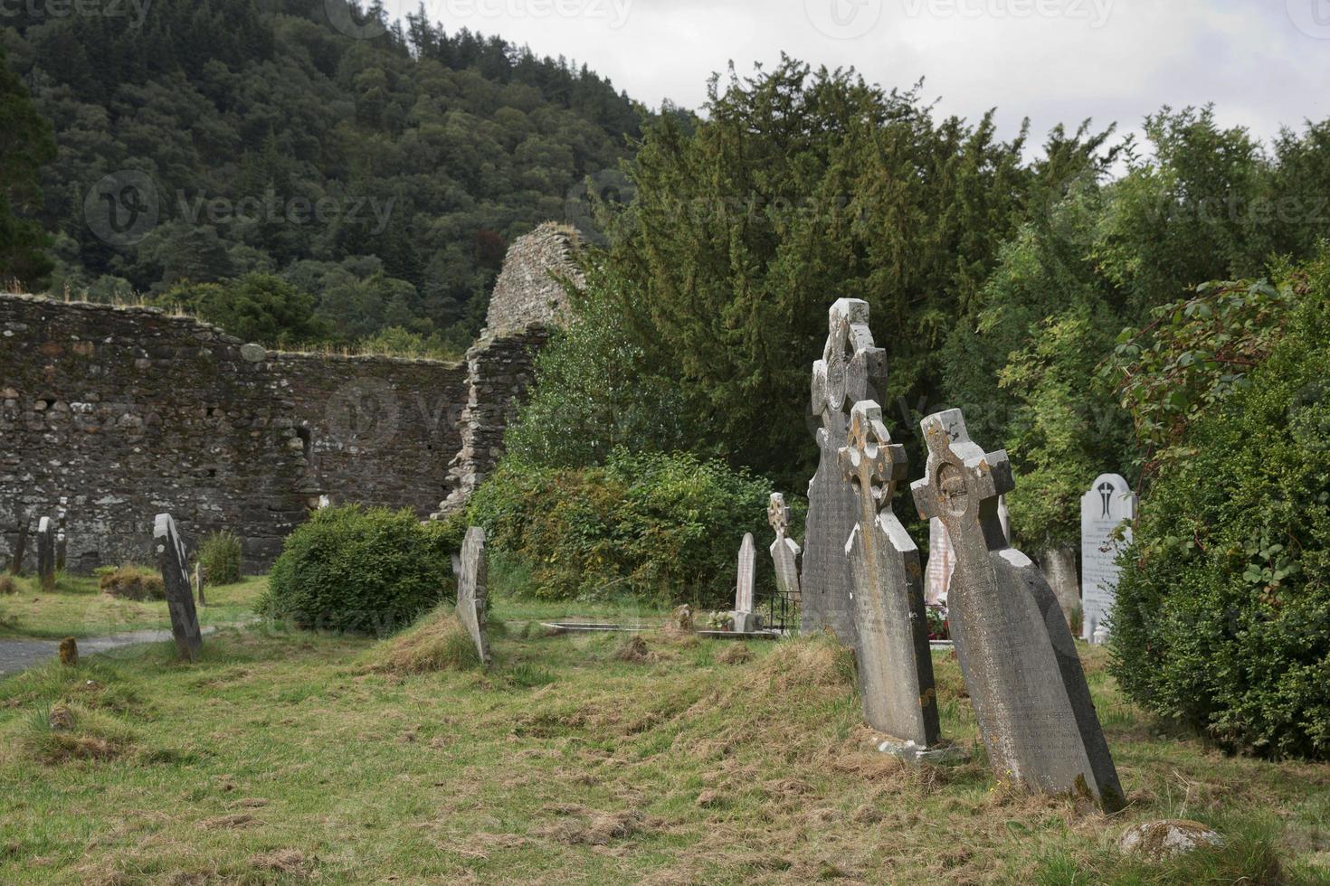 Ruins of a monastic settlement, built in the 6th century in Glendalough, Ireland photo