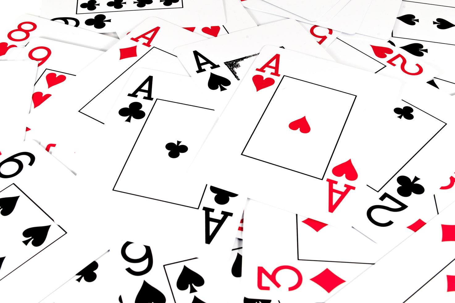 Isolated playing cards on white background photo