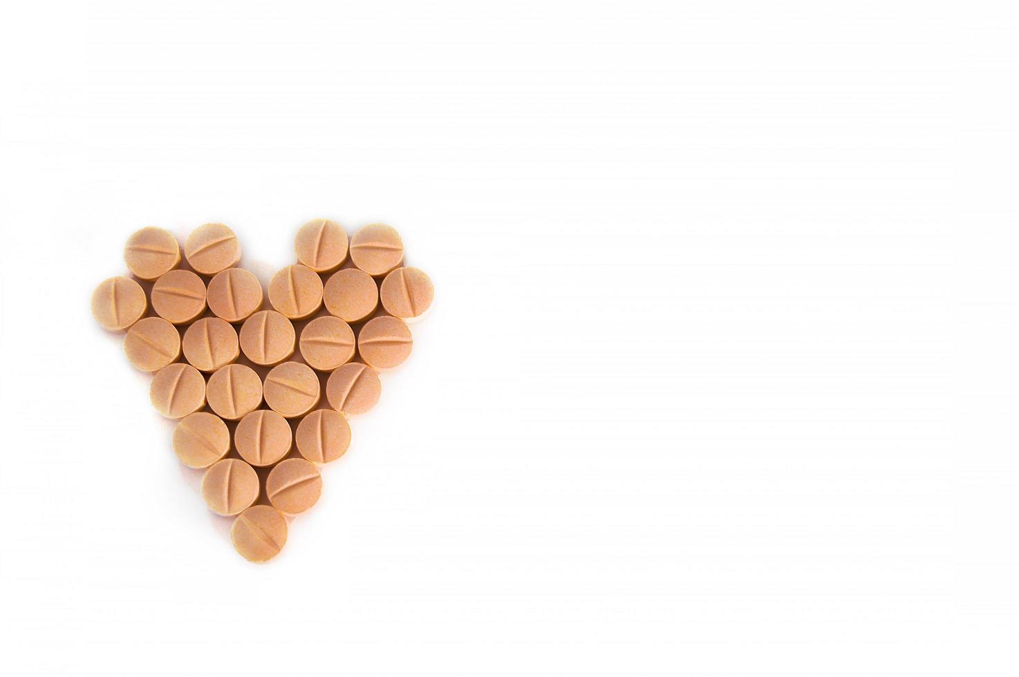 White medical pills and tablets with bottle photo