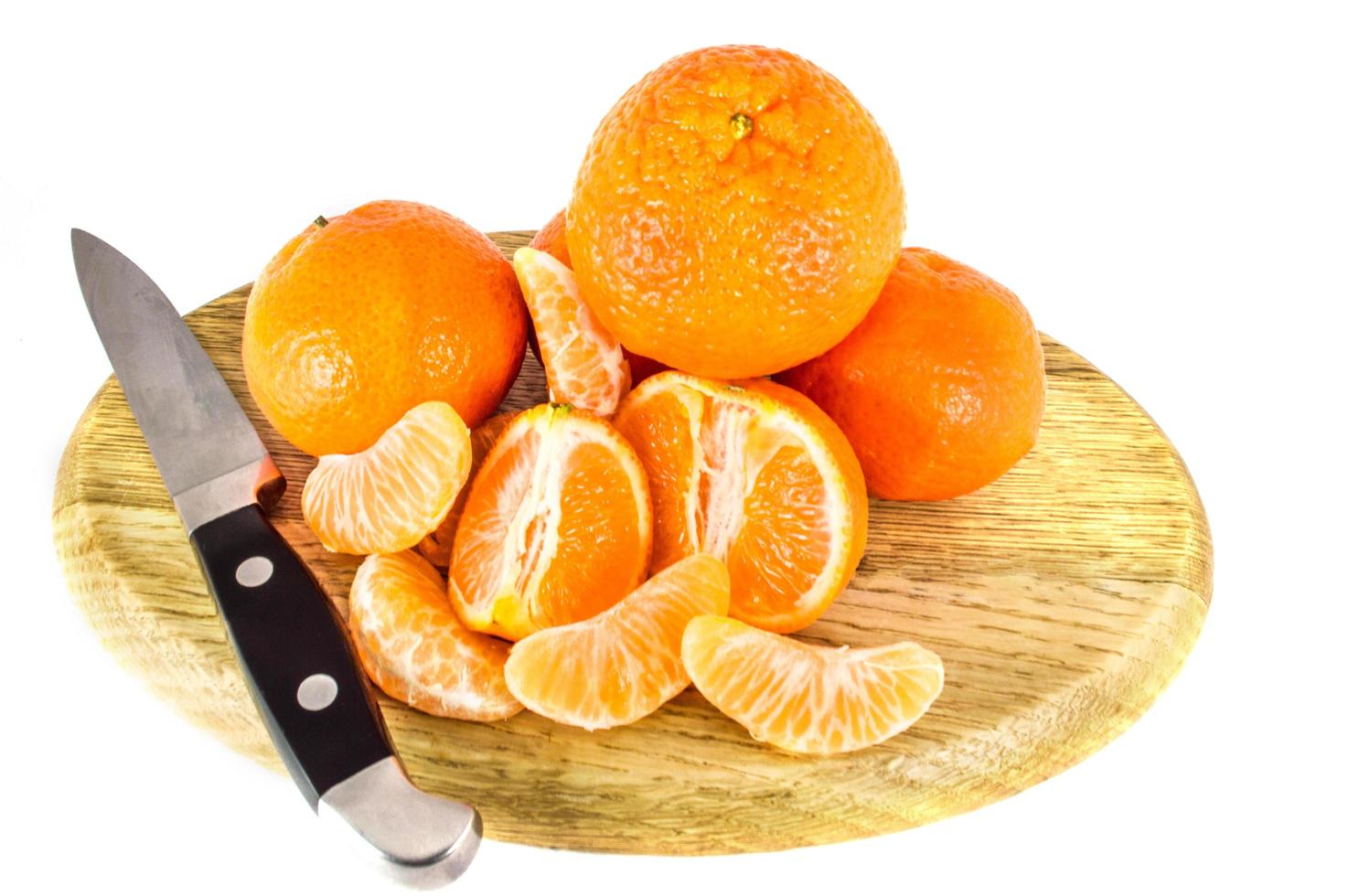 Orange mandarins  tangerine peel or mandarin slice isolated on white background photo