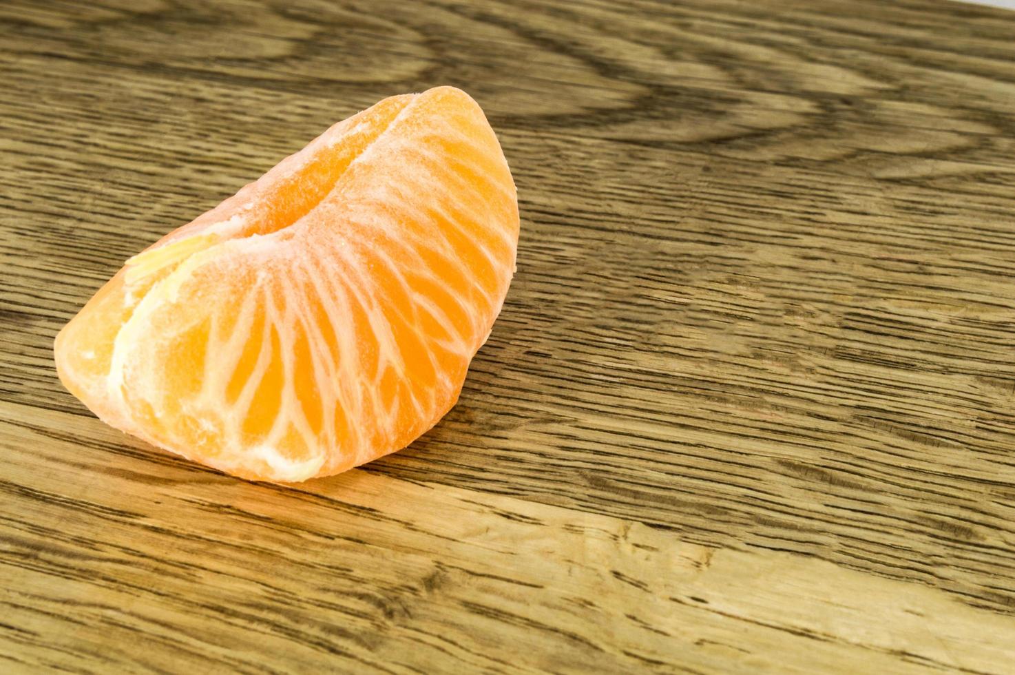 Orange mandarins tangerine peel or mandarin slice isolated on white background photo