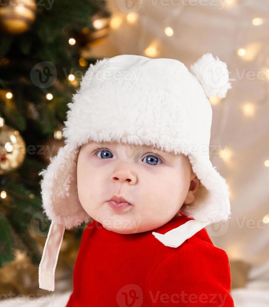 navidad bebe mirando a la camara foto