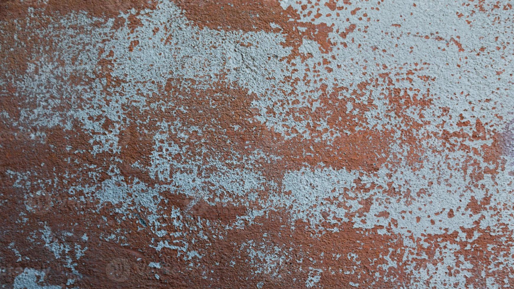 Rusty metal wall old sheet of iron covered with rust with multicolored paint background texture photo