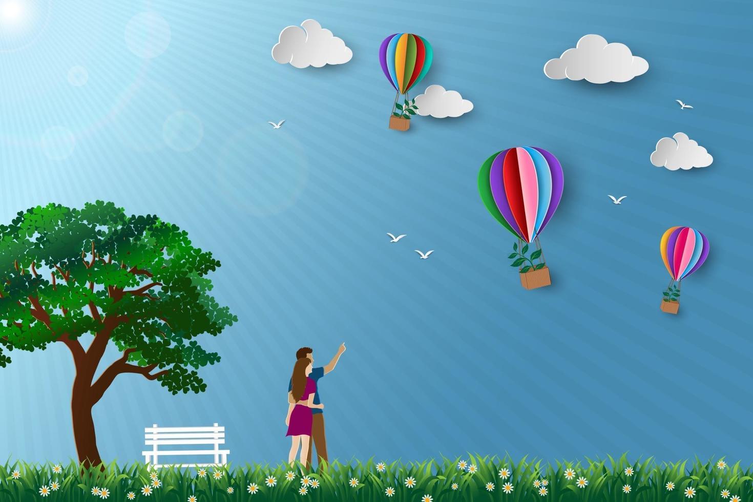 Concept of eco friendly save the environment conservation couple standing in the meadow and looking to hot air balloon flying with tree vector
