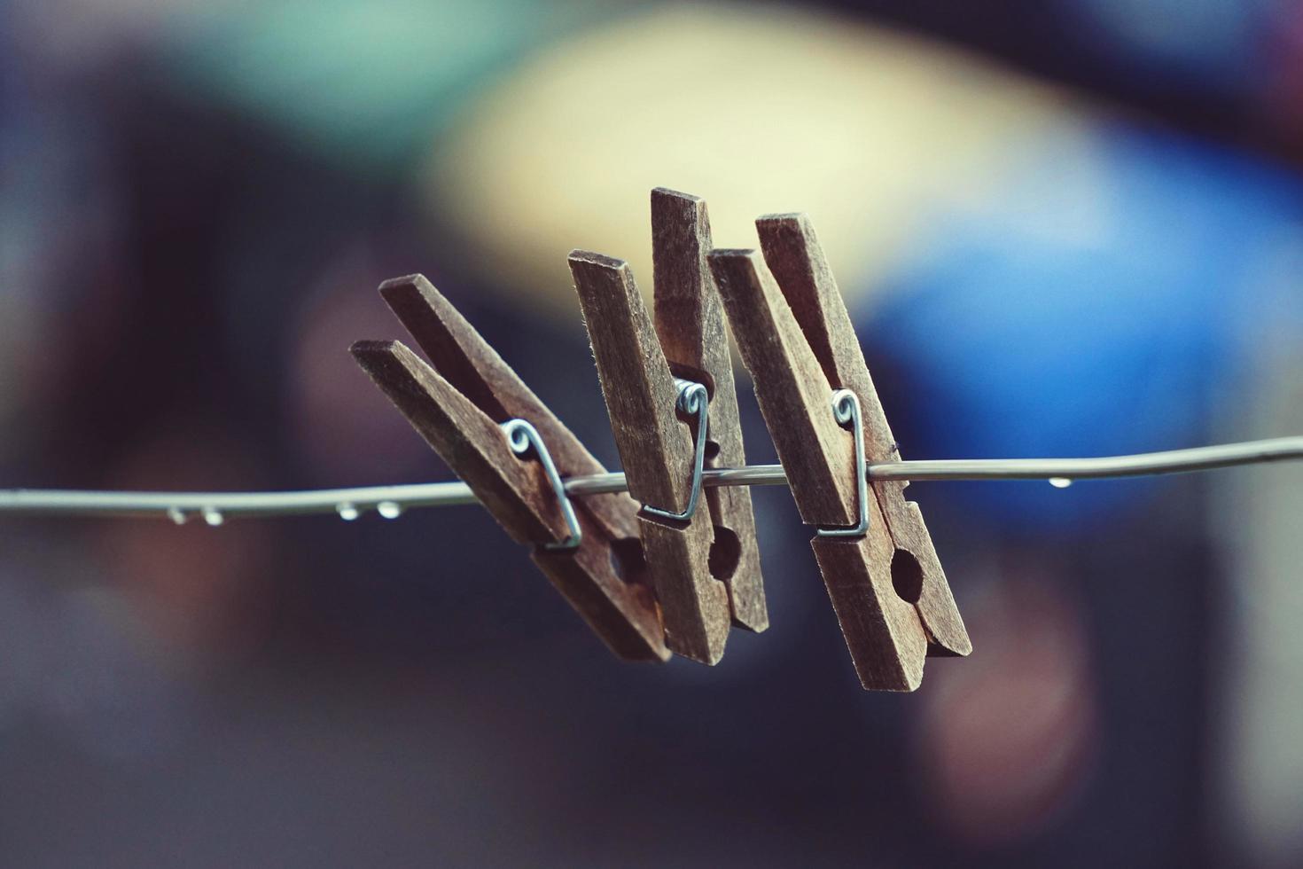 wooden clothespin on the rope photo
