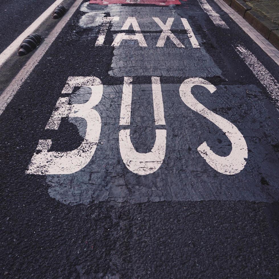 taxi stand and bus stop traffic signal on the street photo