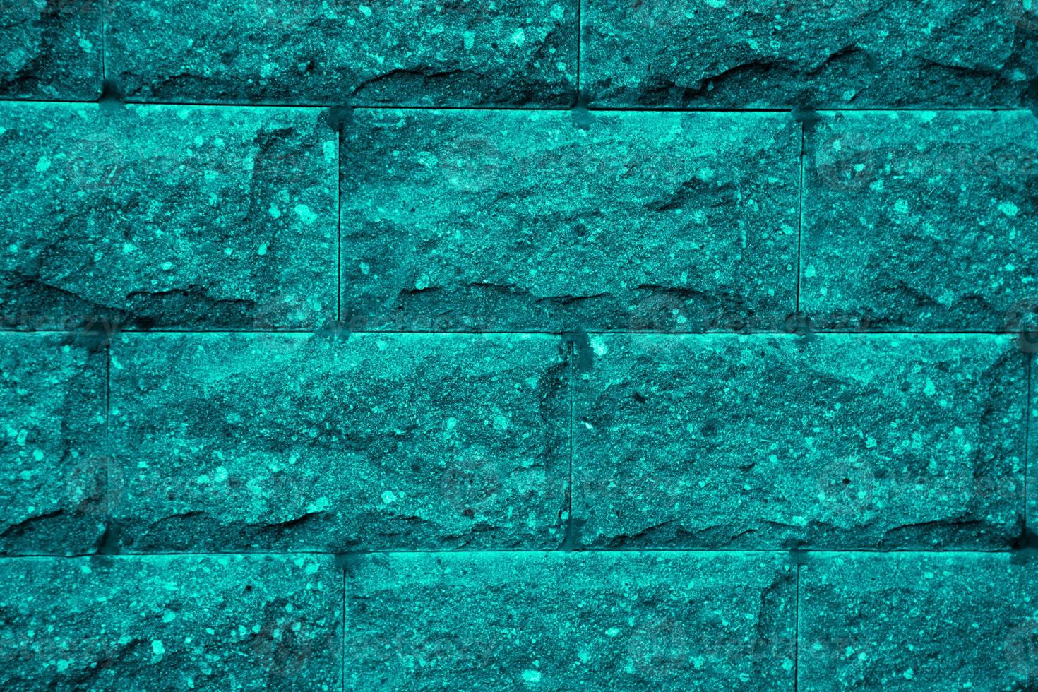 Blue brick wall texture background close-up photo