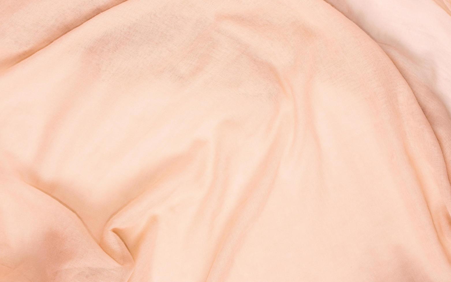 Delicate soft and wrinkled fabric cream colored photo