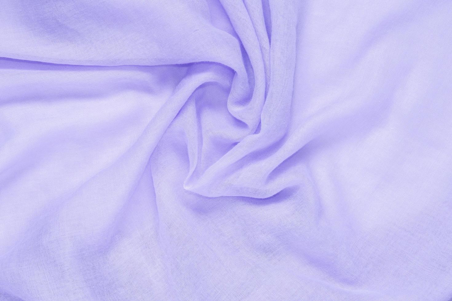 Delicate soft and wrinkled purple fabric photo