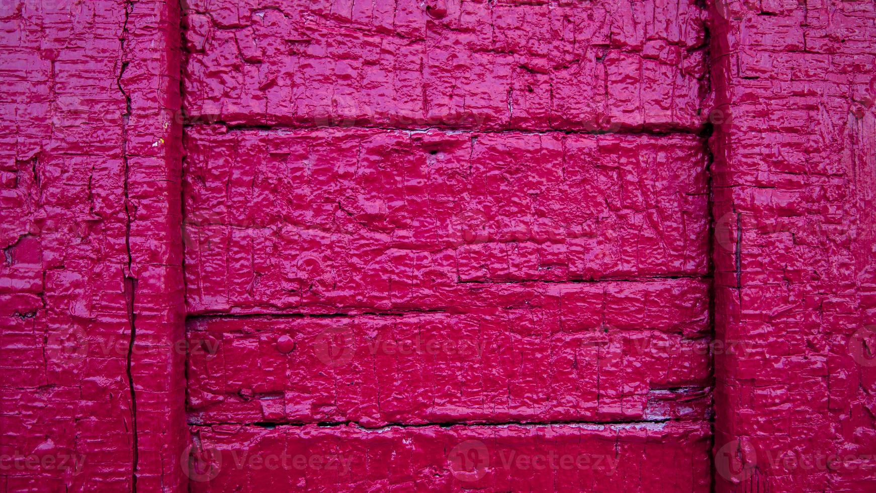 Fondo de textura de madera viejos paneles de color rosa foto