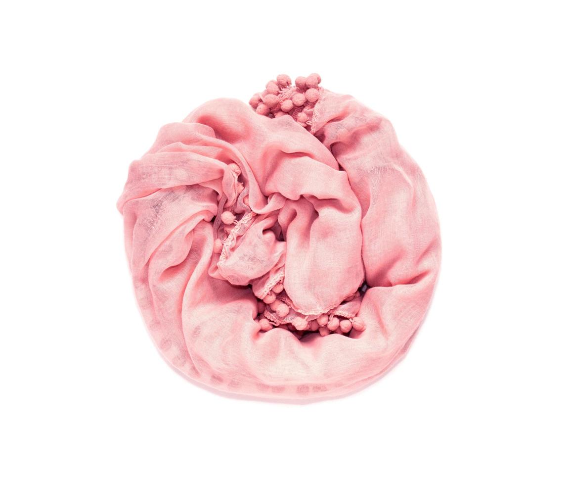 Delicate soft and crumpled twisted fabric in a circle photo